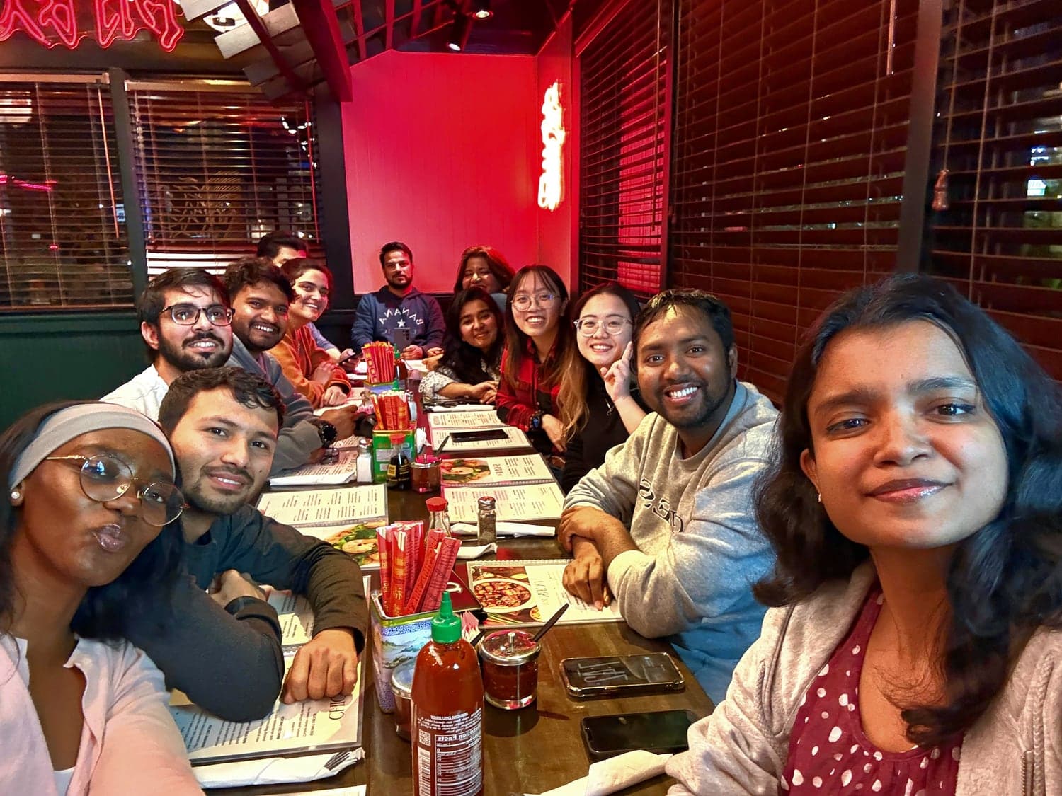 Racheal at dinner with International Student Organization members
