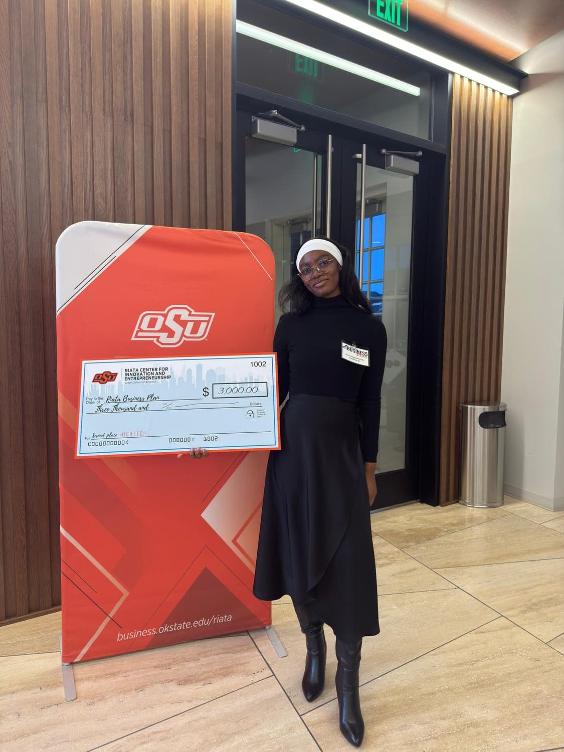 Racheal winning at the Riata Business Case Competition